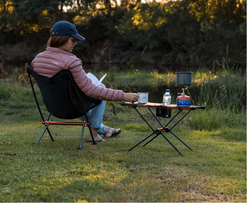 Nomad x Naturehike ultralight folding camping table with mesh surface, portable design, ideal for outdoor camping and picnics