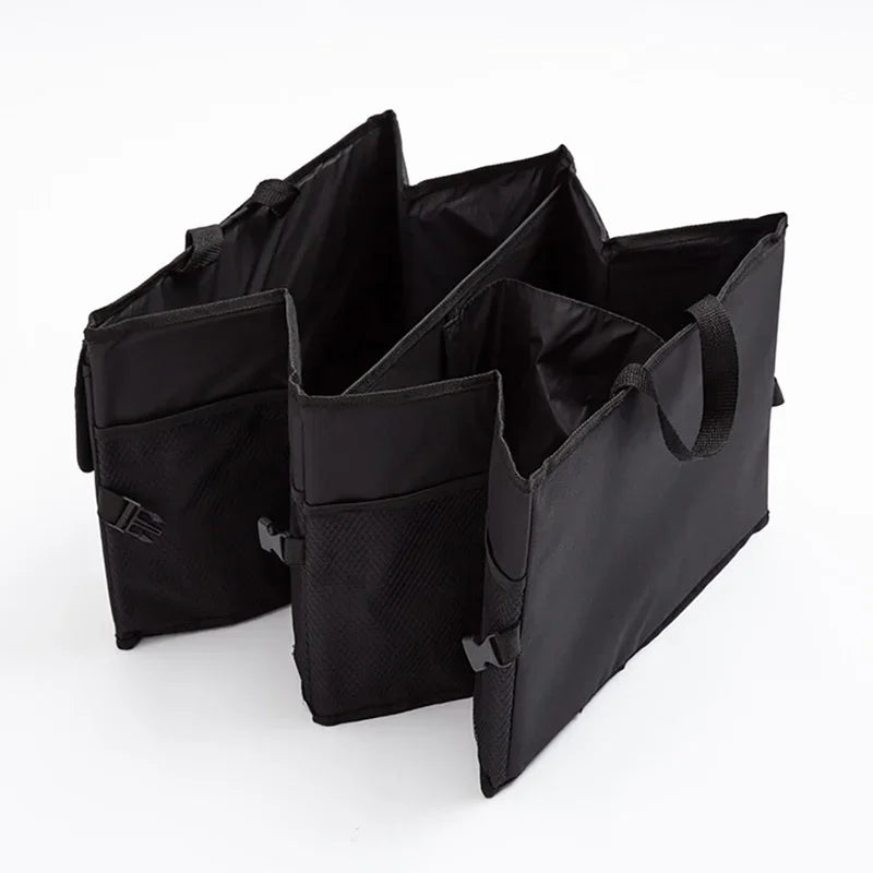 Nomad Cabin Caddy freestanding car storage box with integrated tablet view, black plastic organizer for vehicle interior storage.