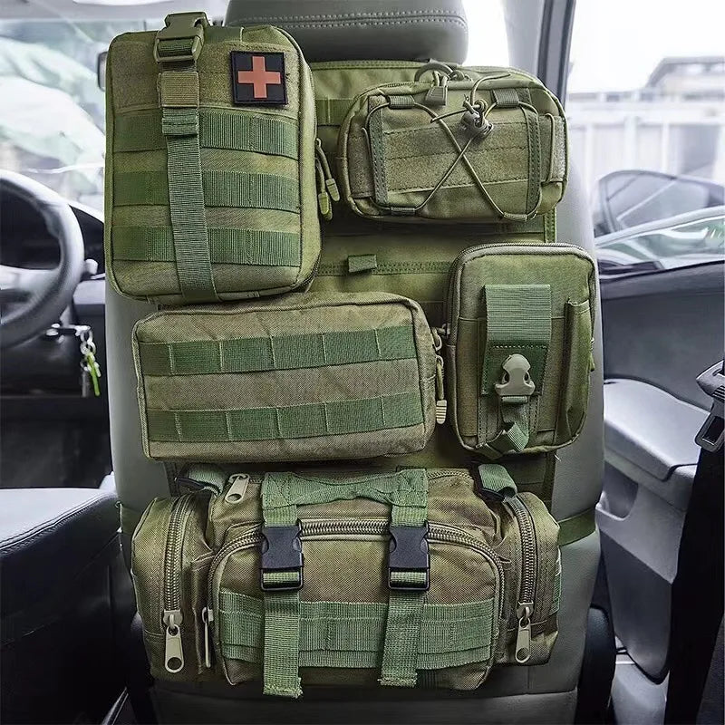 Nomad Tactical Car Seat Back Organizer by Nomad Pacific Supply, showing multiple storage pockets and durable nylon material.