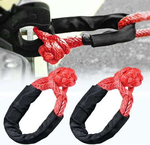 Nomad Pacific Supply heavy-duty synthetic soft shackle and recovery ring set for off-road vehicle recovery, durable and high-strength.