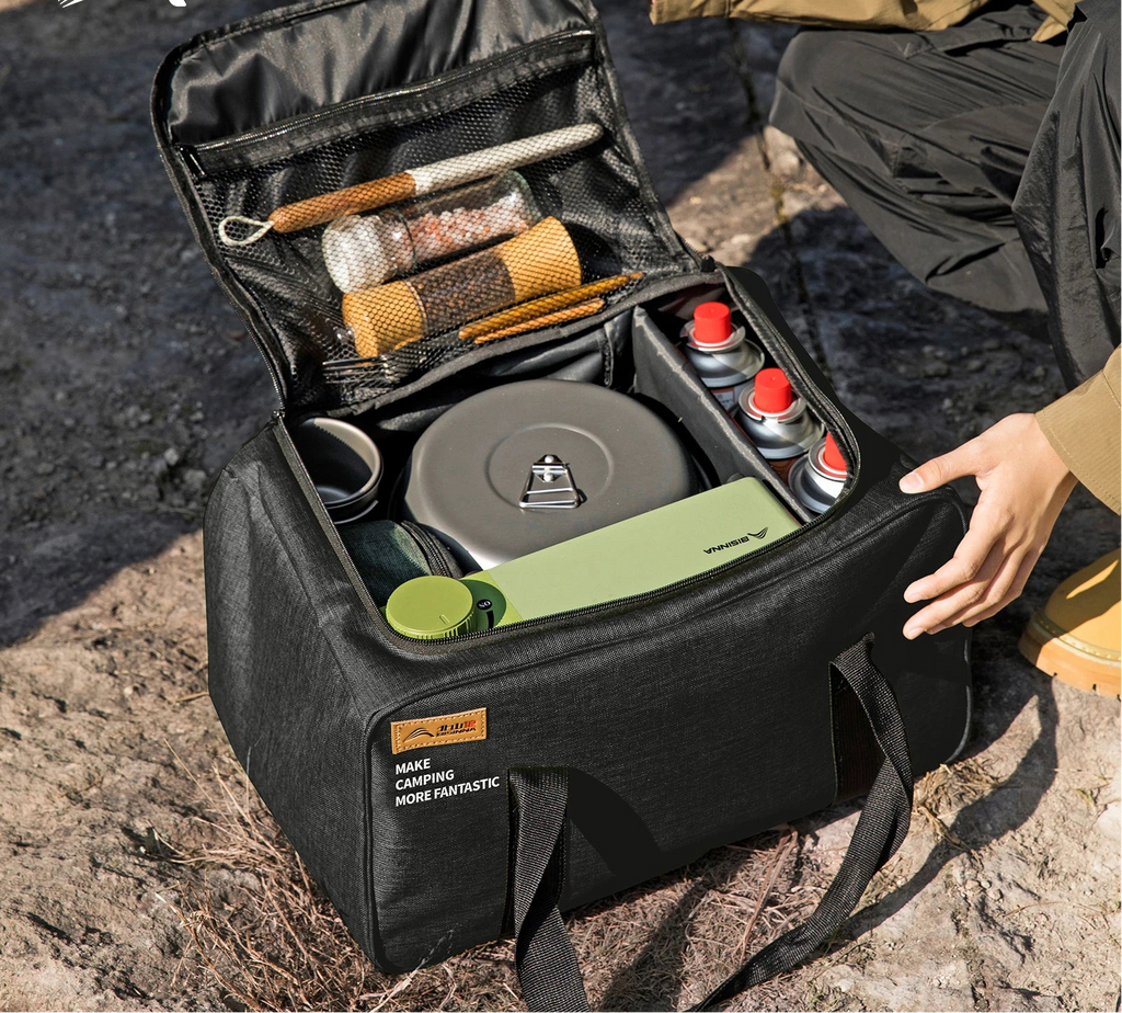 Nomad 26L Heavy-Duty Camp Kitchen and Gear Organizer with multiple compartments and sturdy handles for outdoor camping.
