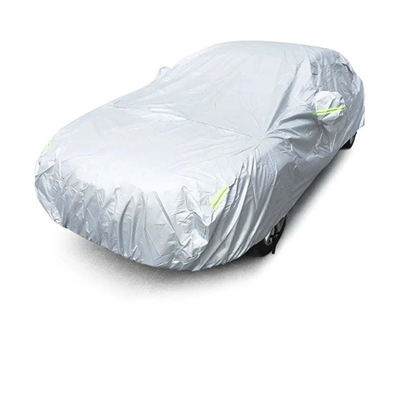 Heavy-duty Nomad Shield outdoor car cover protecting a vehicle from weather and outdoor elements, all-weather exterior protection.