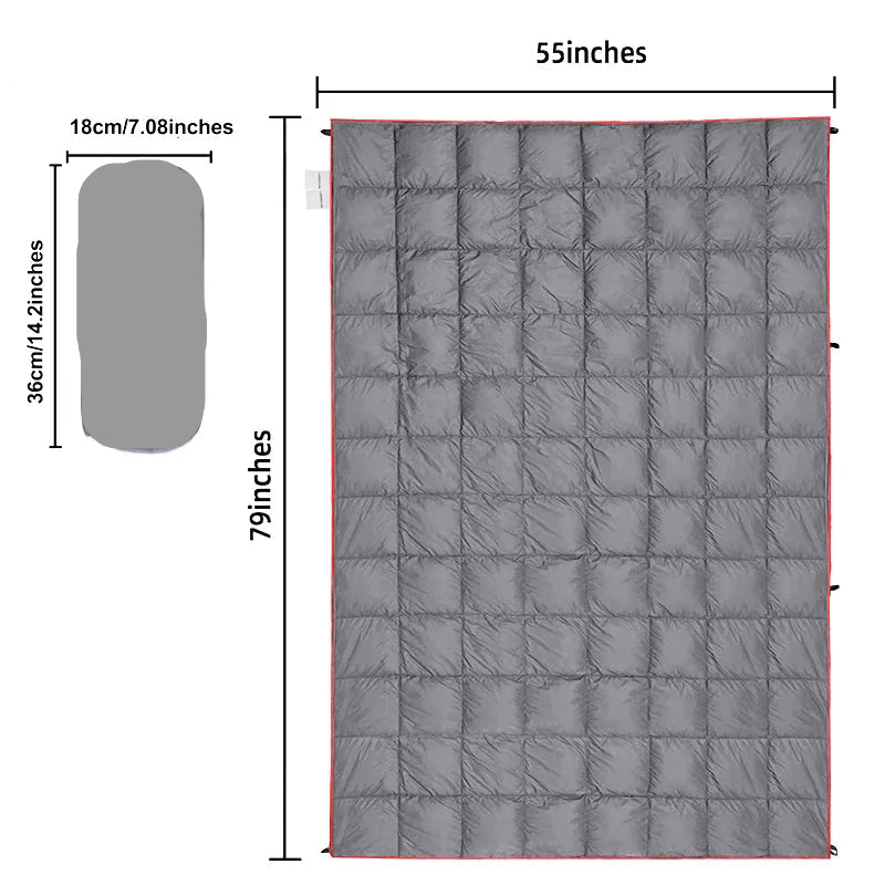 Nomad Pacific Supply Puffy Camp Blanket, lightweight weatherproof trail quilt, shown folded with its packable, all-season travel design