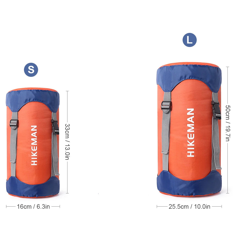Nomad Waterproof Compression Stuff Sack by Nomad Pacific Supply, shown compressed and folded for outdoor gear storage.