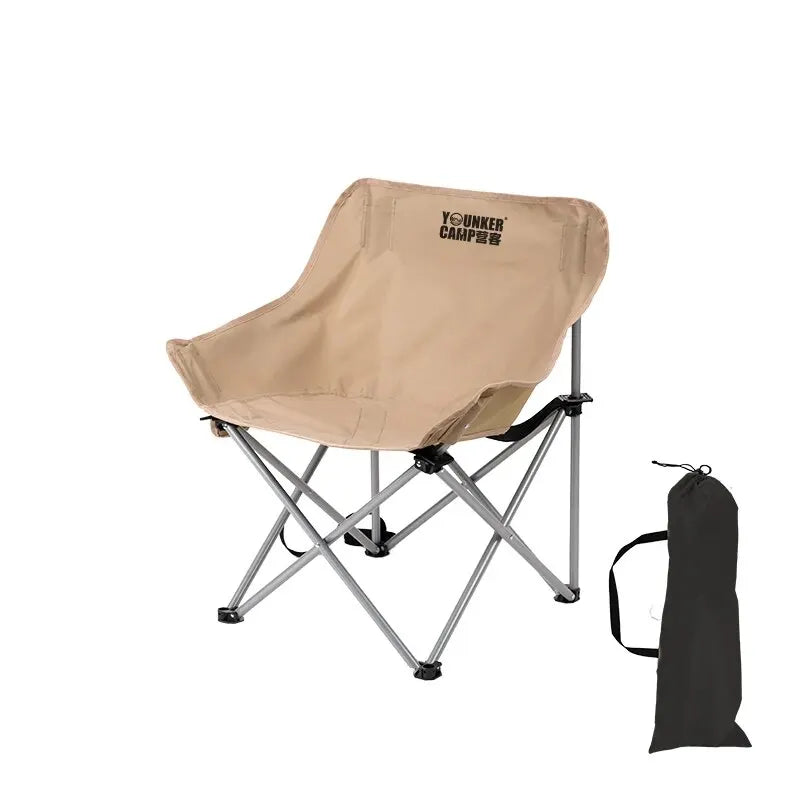 Nomad Heavy-Duty Folding Camping Chair by Nomad Pacific Supply, portable steel moon chair with sturdy frame and fabric seat.