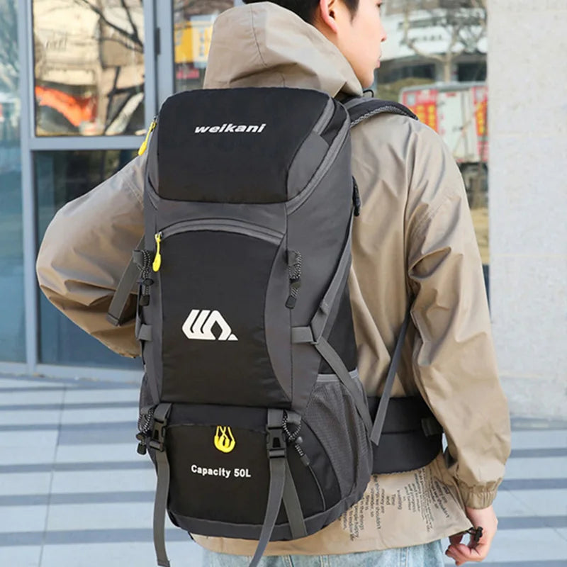 Nomad TrailBlaizer 50L waterproof hiking backpack with multiple pockets and heavy-duty design, suitable for trekking adventures.