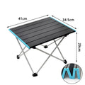 Nomad Pacific Supply Ultralight Aluminum Folding Camping Table with roll-up design, portable dinner desk for outdoor camping use.