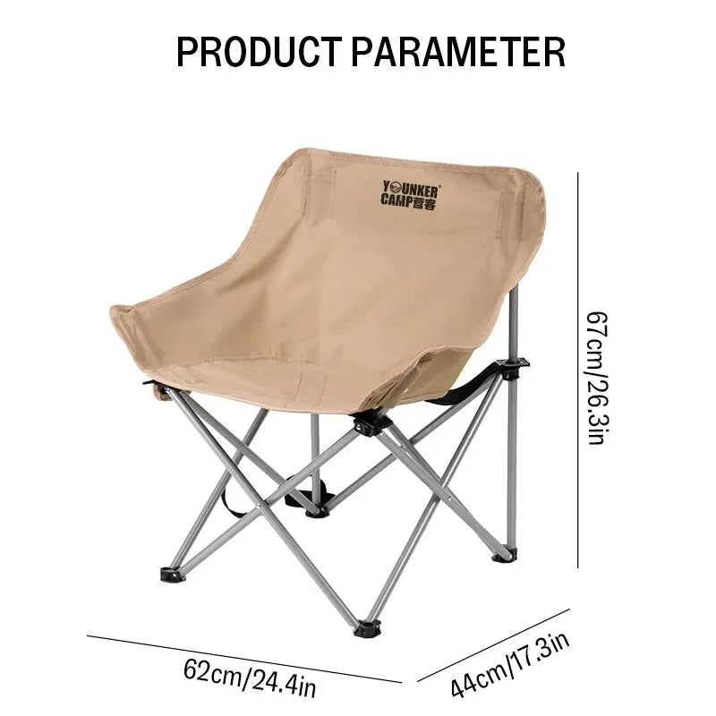 Nomad Heavy-Duty Folding Camping Chair by Nomad Pacific Supply, portable steel moon chair with sturdy frame and fabric seat.