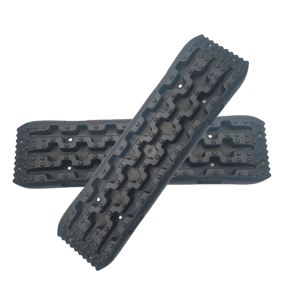 Pair of Nomad Heavy-Duty 10-Ton Off-Road Recovery Tracks for vehicle traction and recovery in rugged terrain.