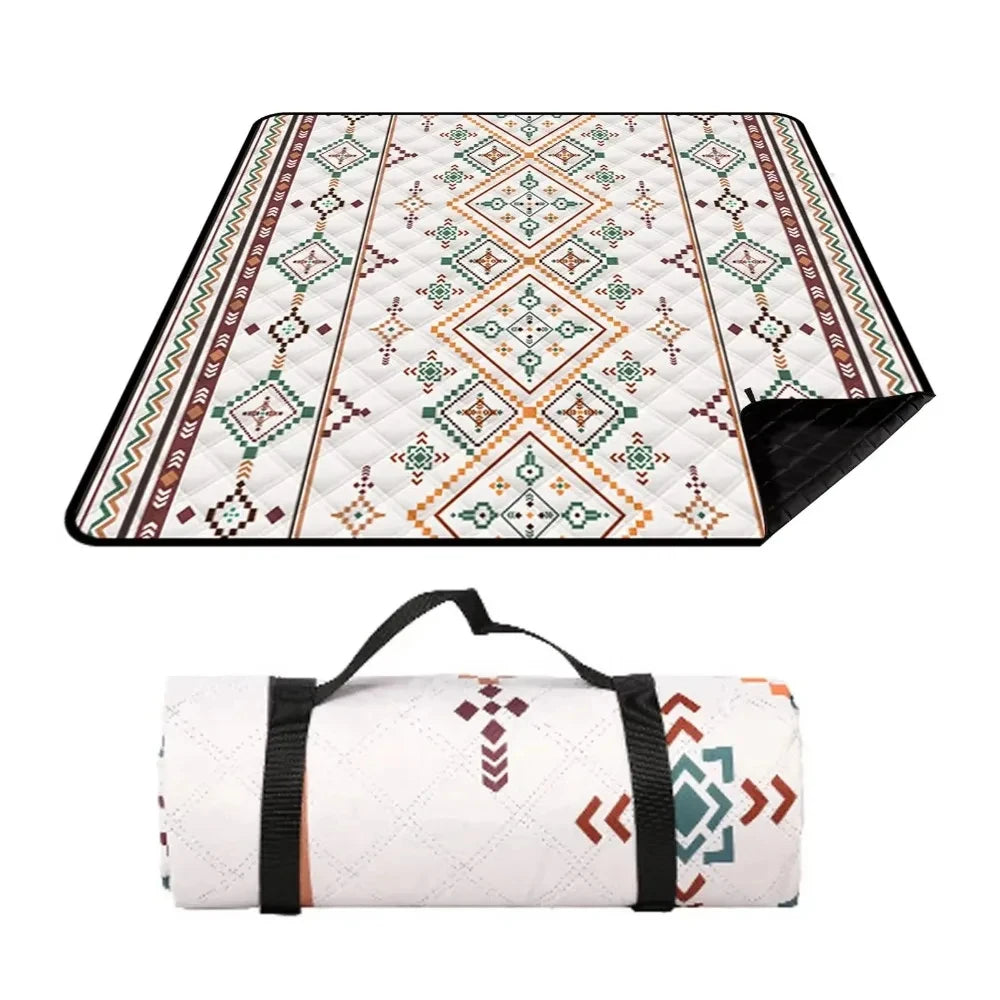 Large waterproof Nomad Pacific Supply picnic blanket, 200x200cm outdoor beach mat with carrying handle for camping and beach use.