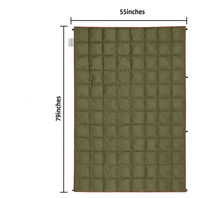 Nomad Pacific Supply Puffy Camp Blanket, lightweight weatherproof trail quilt, packable all-season travel comforter in outdoor setting