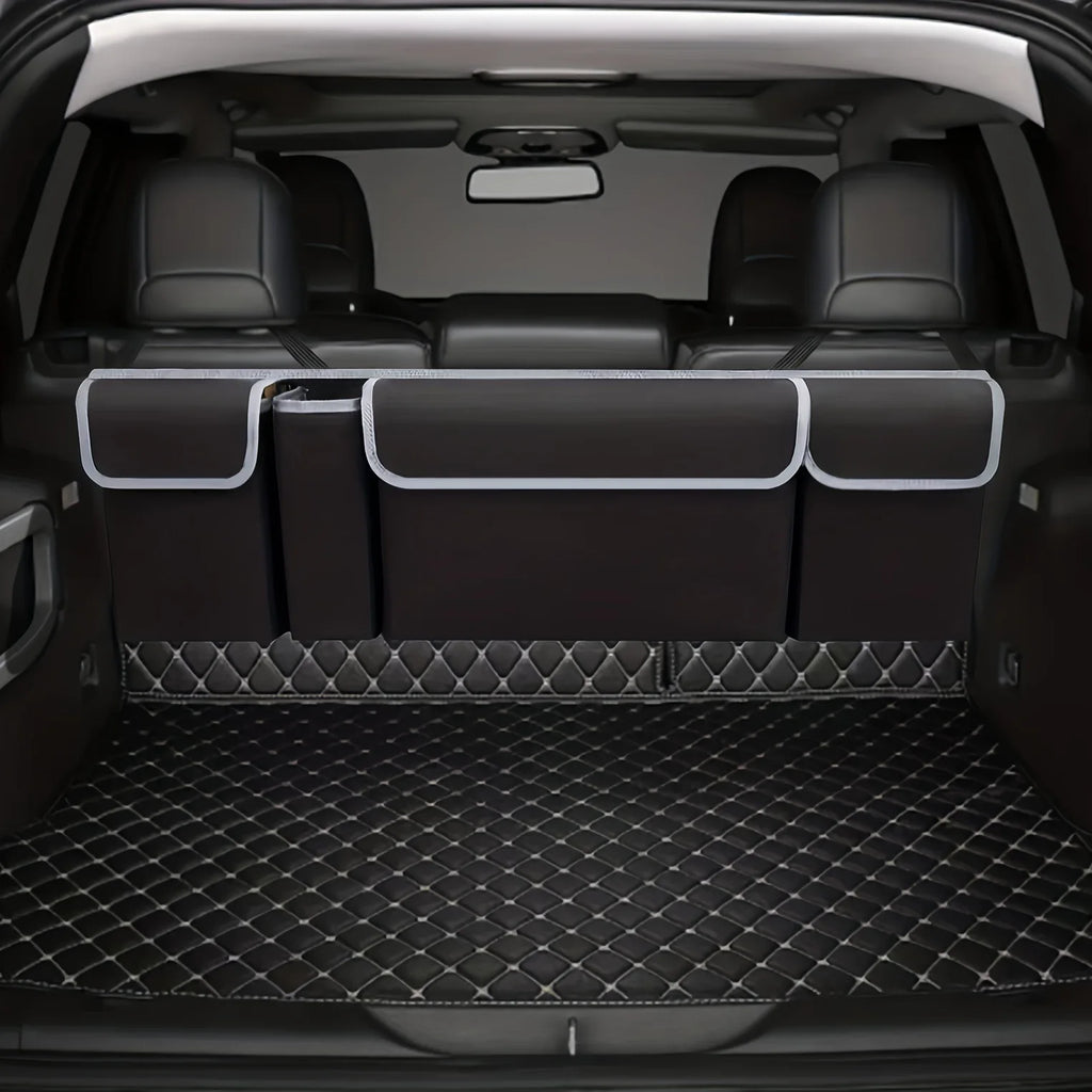 Nomad Trunk Elite hanging organizer in Oxford cloth with multiple compartments, designed for SUVs and hatchbacks.