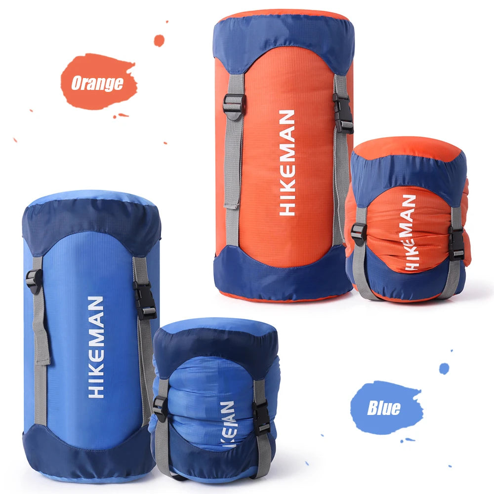 Nomad Waterproof Compression Stuff Sack by Nomad Pacific Supply, shown in black with roll-top closure and compact design.