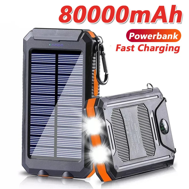 Nomad Pacific Supply solar power bank 80000mAh portable external battery charger with built-in LED light for smartphones.