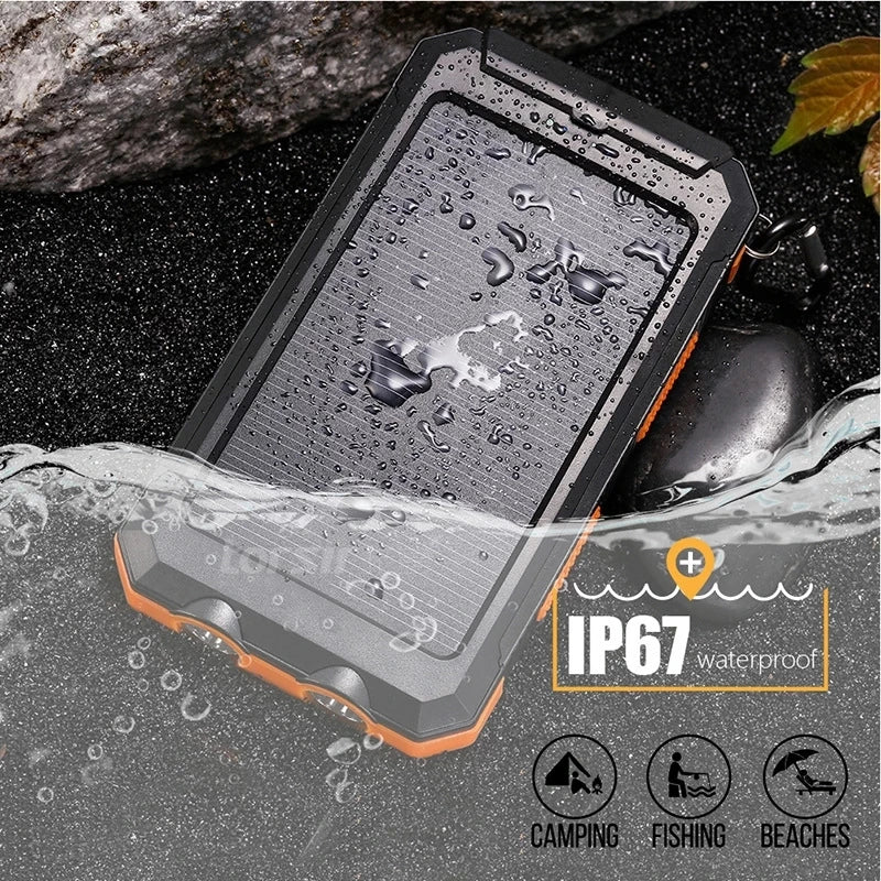Nomad Pacific Supply 80,000mAh solar power bank with LED light and multiple smartphone charging ports in black.