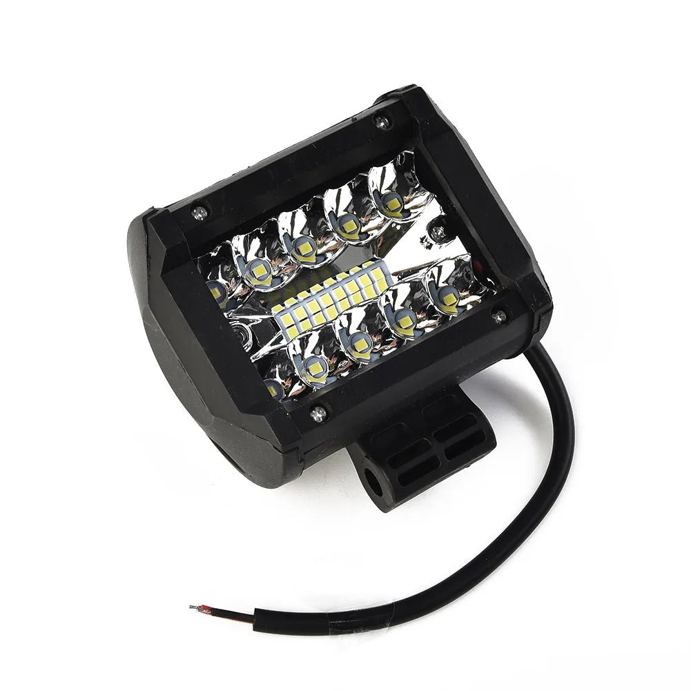 Nomad Pro 60W LED offroad light bar with combo spot and flood beams, waterproof driving lamp for rugged outdoor vehicles.