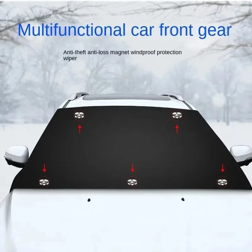 Nomad FrostGuard magnetic windshield cover on car, protecting against snow, ice, and sun during all seasons.